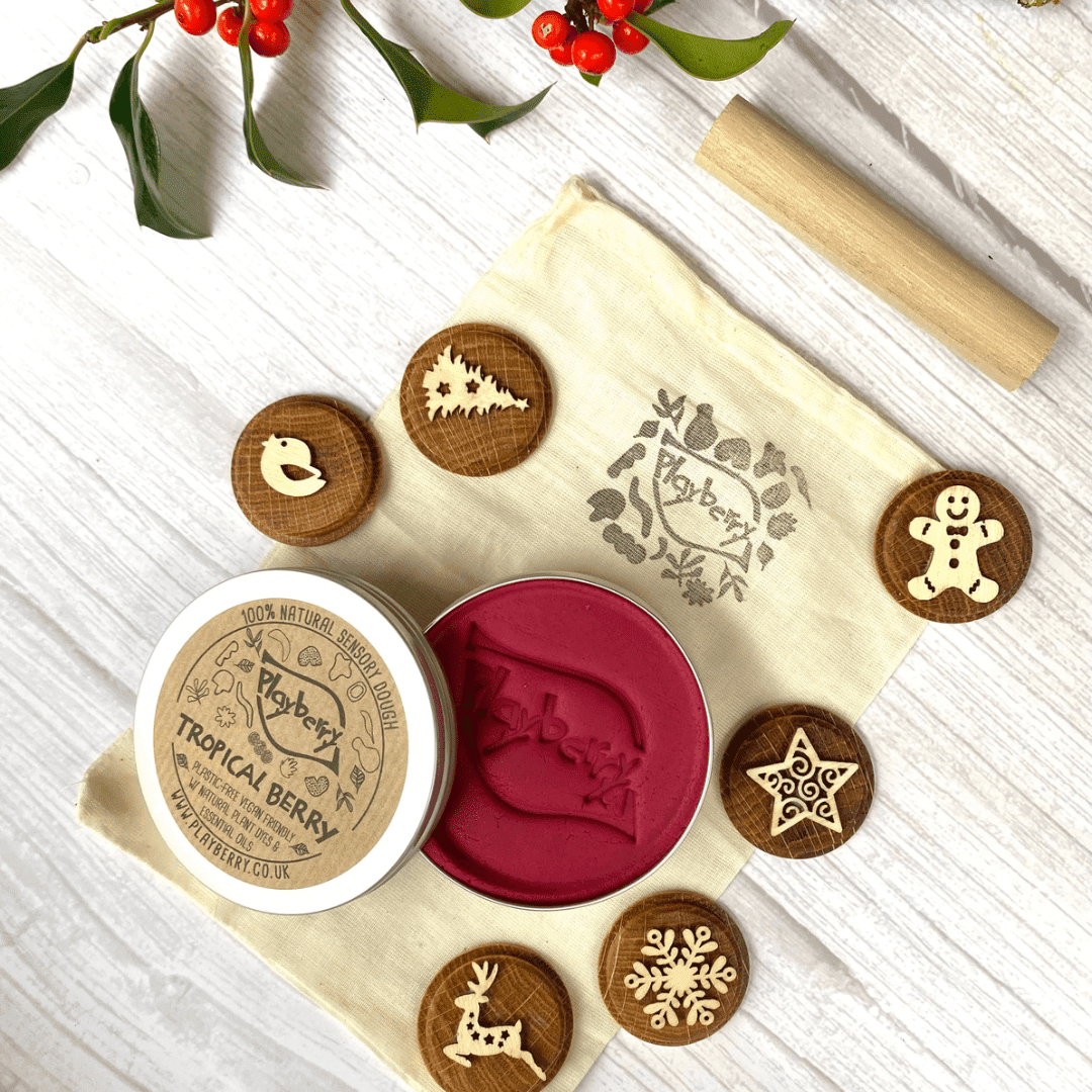 christmas playdough wooden stamps with red playdough made from plants christmas playdough wooden stamps with red playdough made from plants